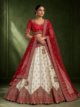 Cream and red bridal lehenga choli with jharokha work