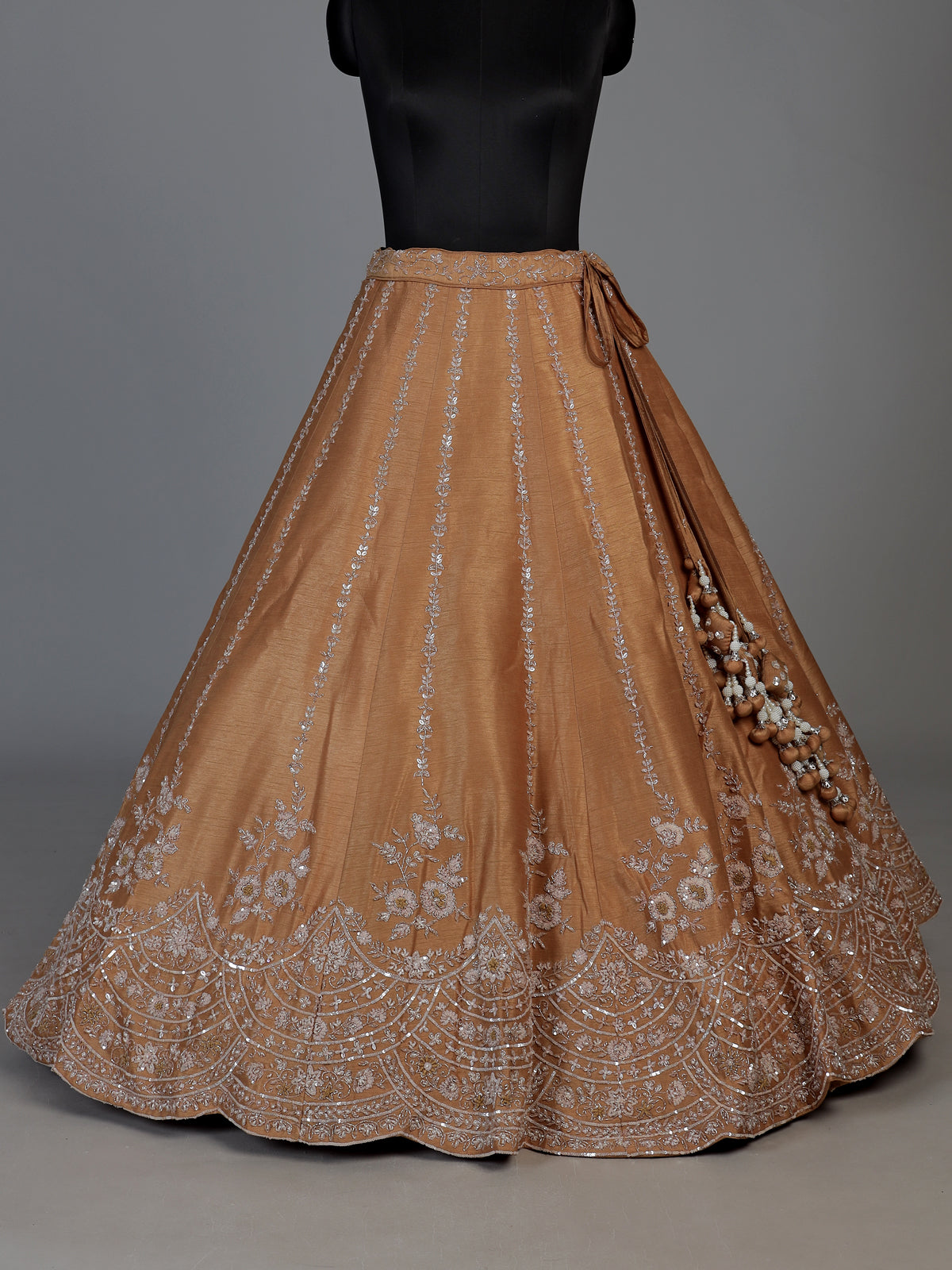 Rust yellow raw silk lehenga choli with zardosi detailing