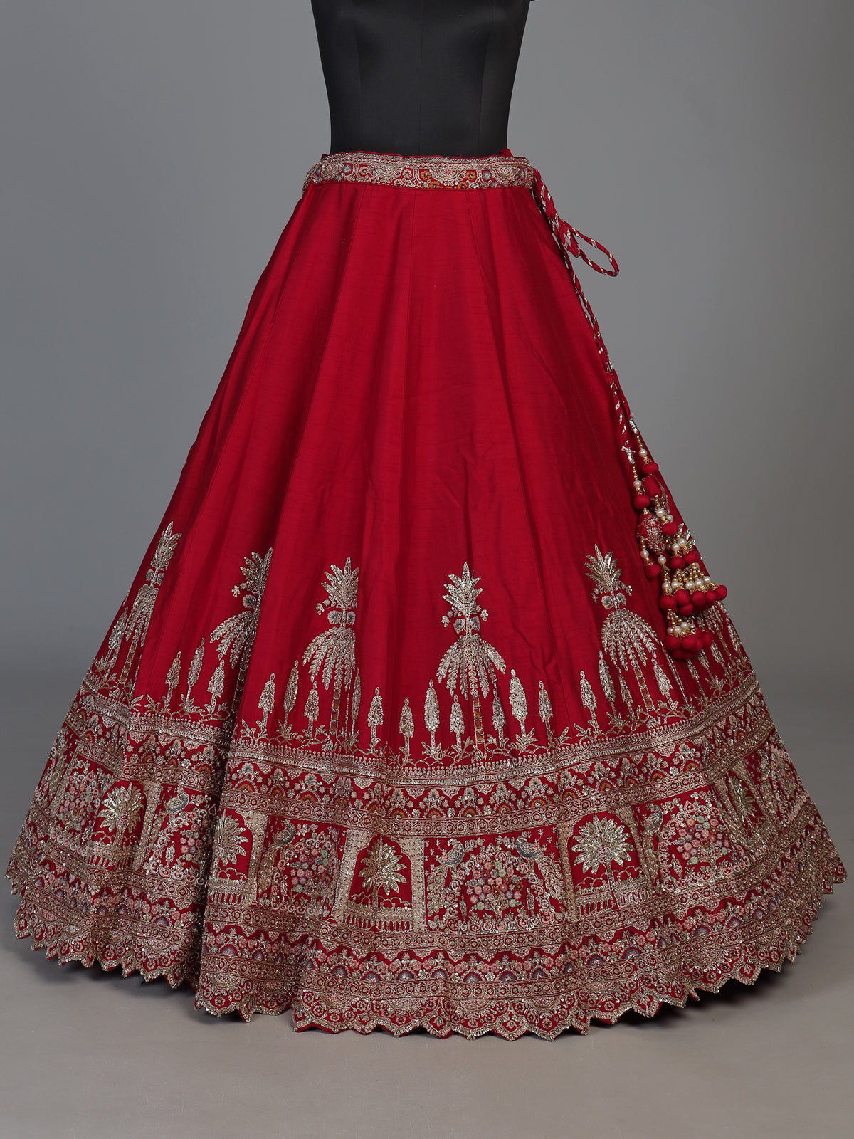 Red raw silk bridal lehenga choli with mughal motifs