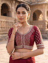 Maroon raw silk bridal lehenga choli with cutdana work