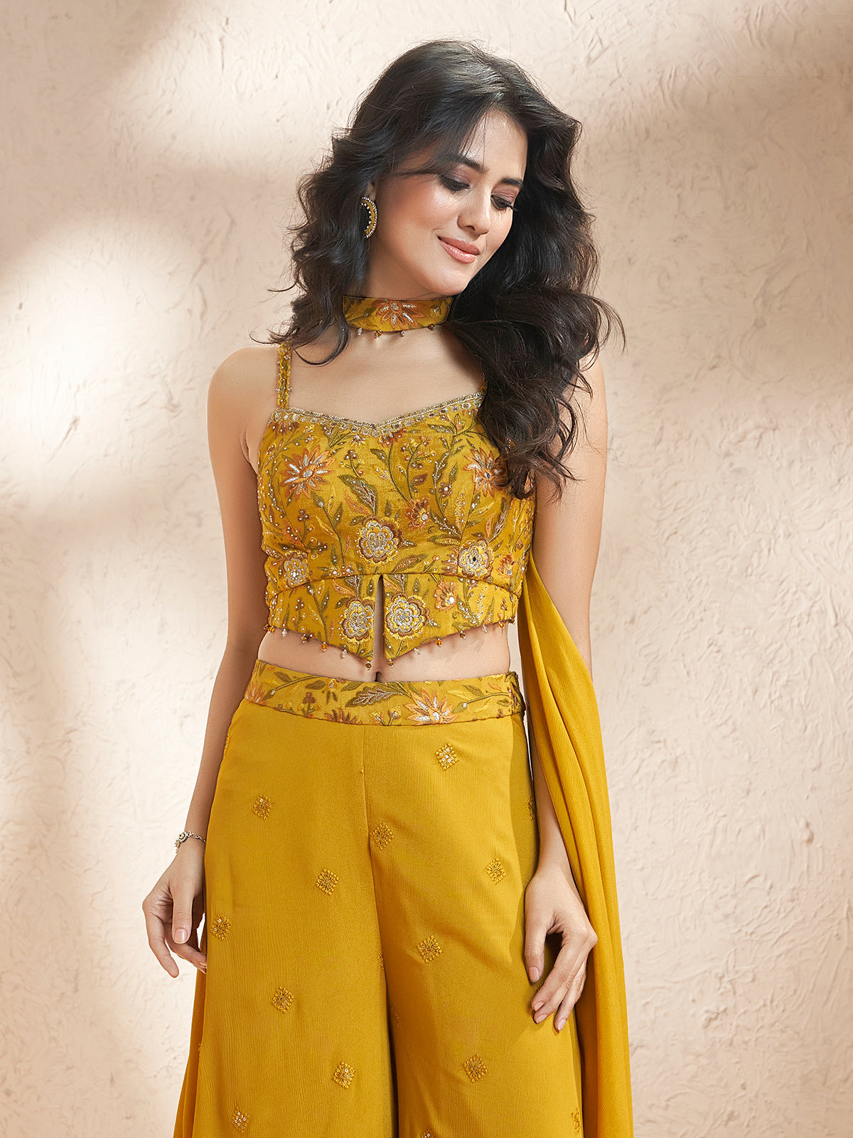 Mustard yellow chiffon georgette palazzo suit for festive celebrations
