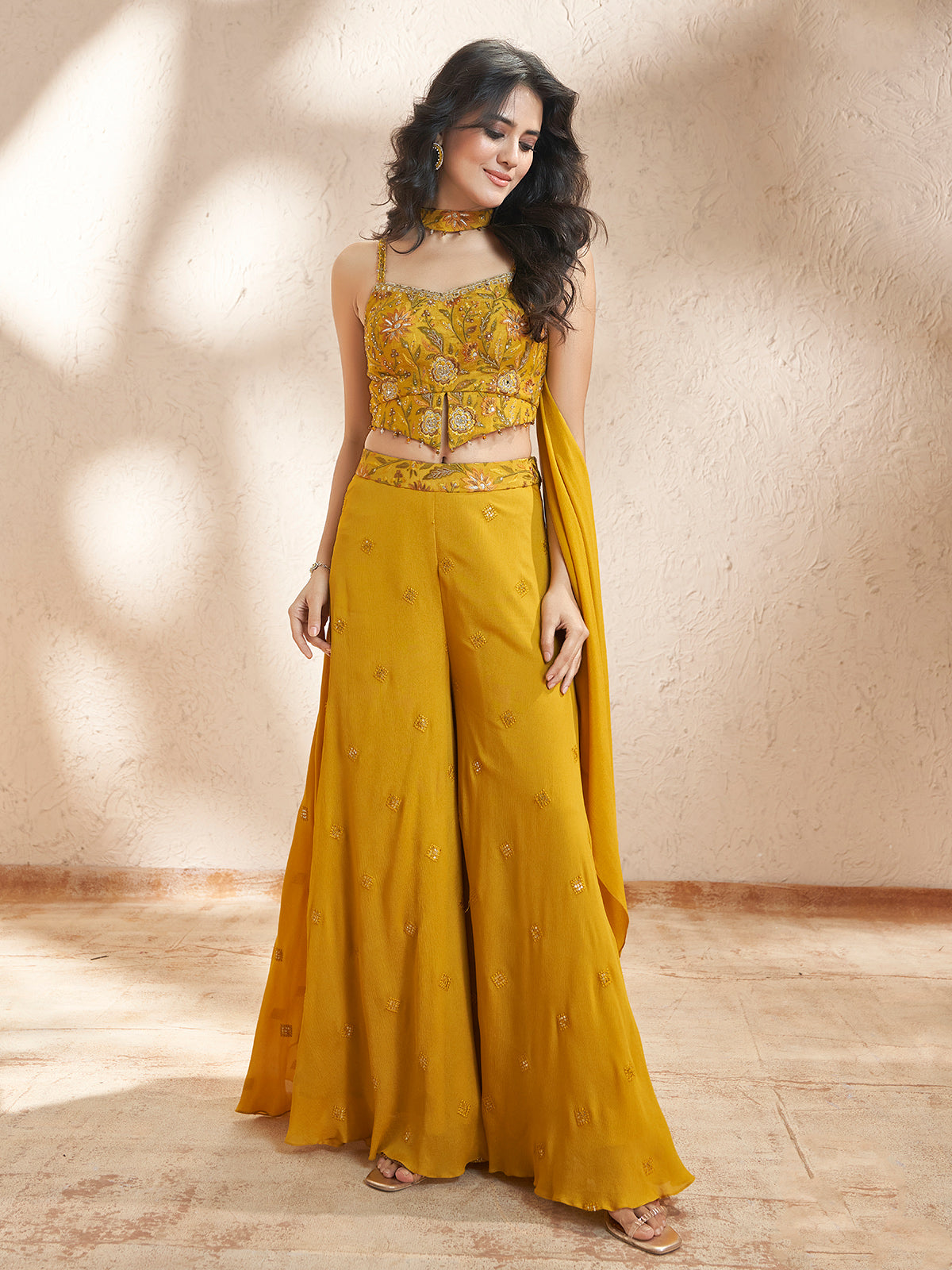 Mustard yellow chiffon georgette palazzo suit for festive celebrations