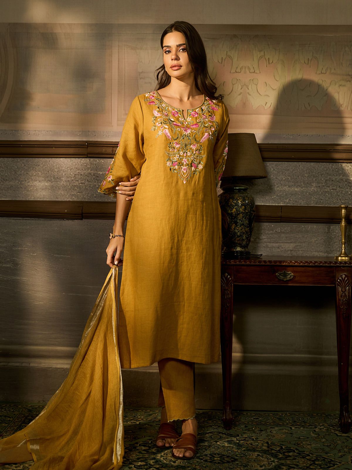 Mustard yellow cotton blend women kurti set with floral embroidery