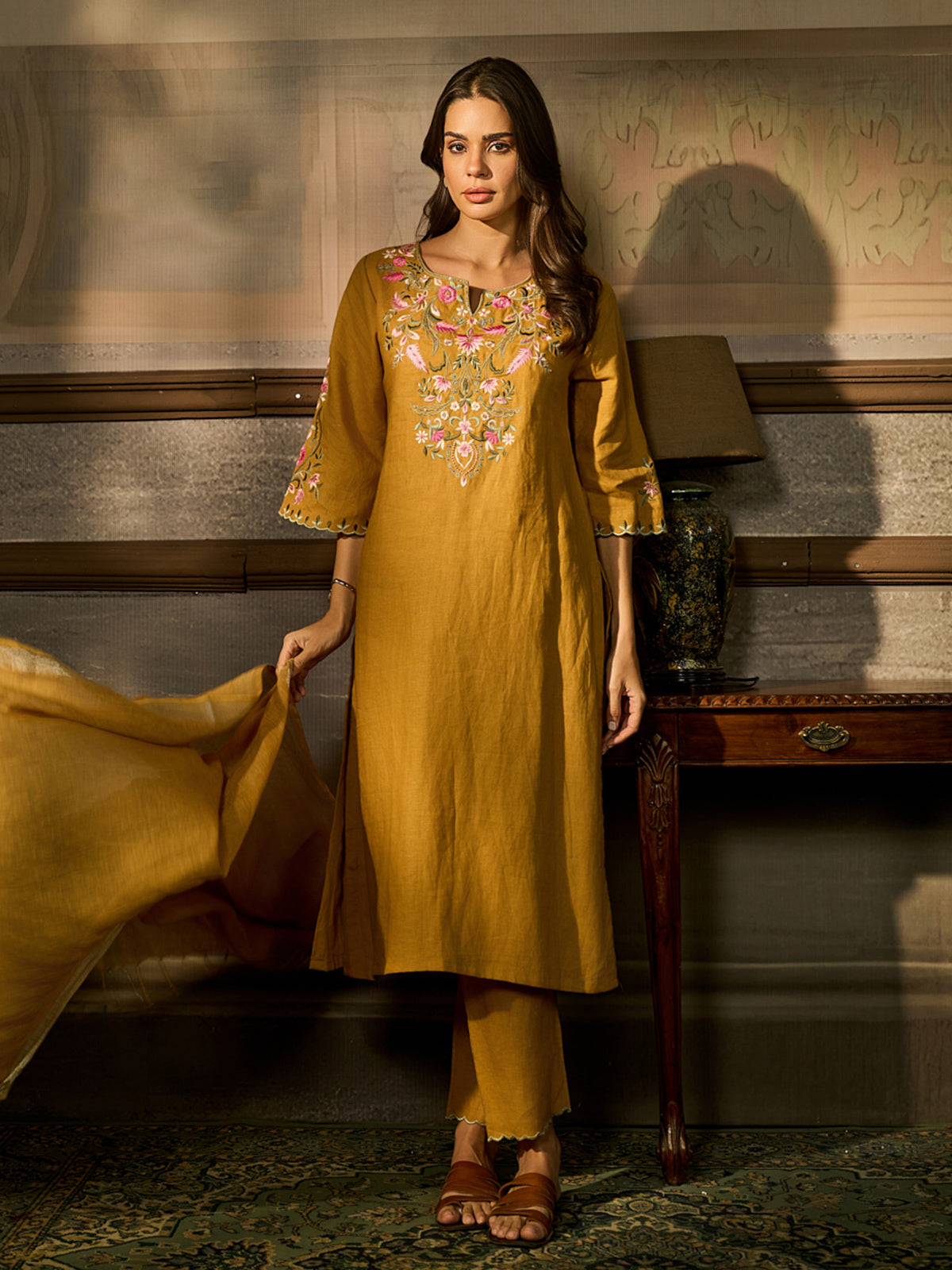 Mustard yellow cotton blend women kurti set with floral embroidery