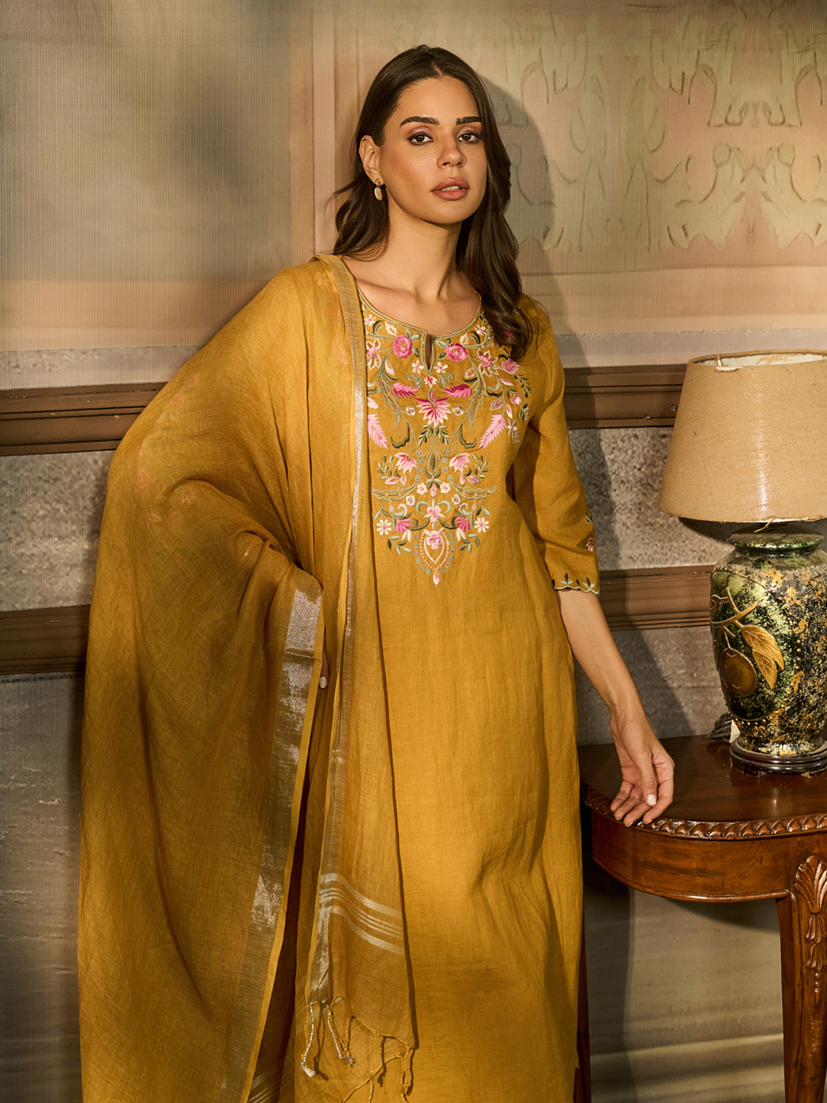 Mustard yellow cotton blend women kurti set with floral embroidery
