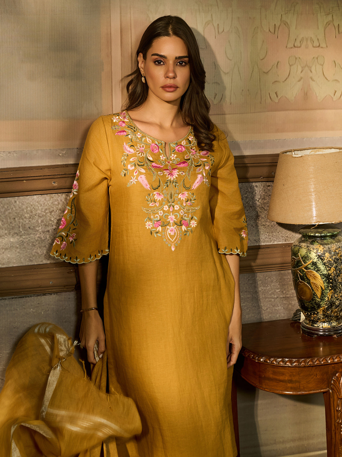 Mustard yellow cotton blend women kurti set with floral embroidery