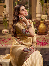 Golden tissue silk women saree with paisley elegance