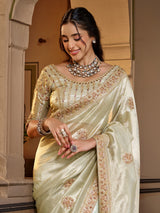 Pista green tissue silk women saree with floral detailing