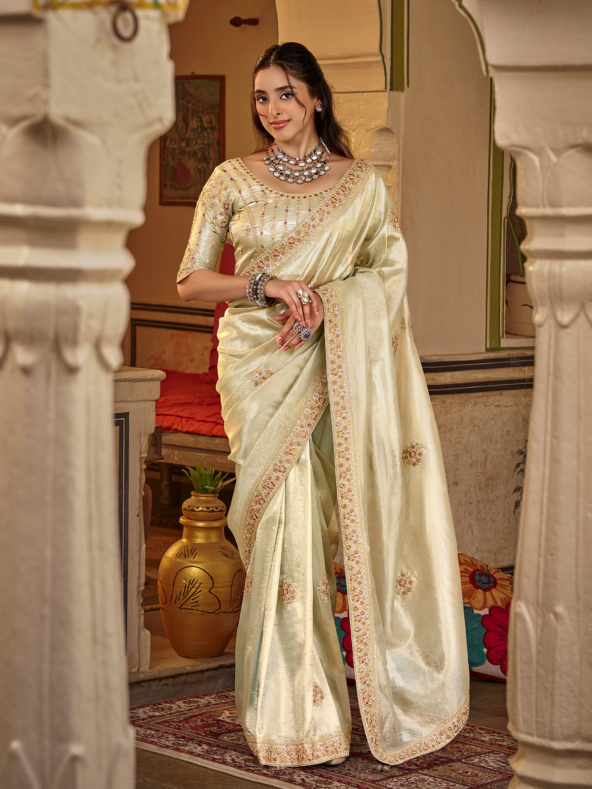 Pista green tissue silk women saree with floral detailing