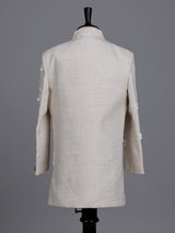 Cream boys linen indowestern set with elegant floral threadwork