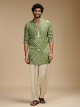 Green art silk mens kurta suit with floral medallions