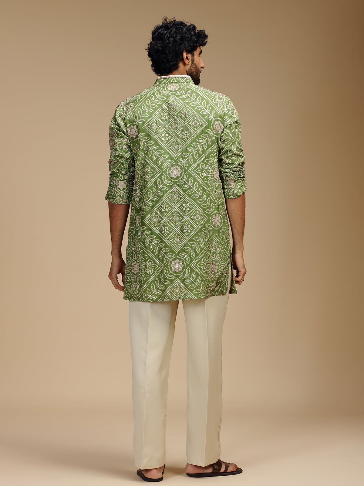 Green art silk mens kurta suit with floral medallions