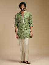Green art silk mens kurta suit with floral medallions