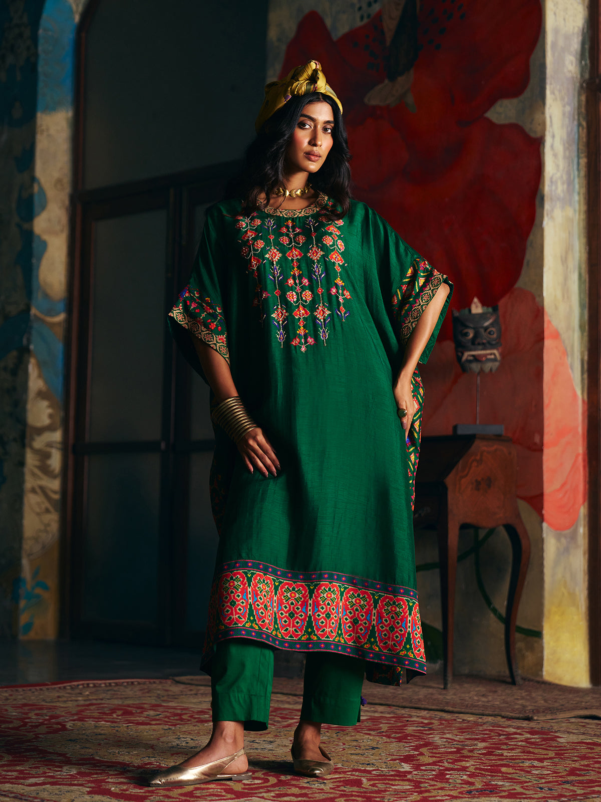 Mehendi green womens kaftan style suit with floral embroidery