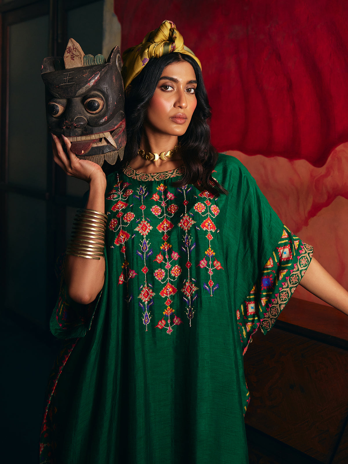Mehendi green womens kaftan style suit with floral embroidery