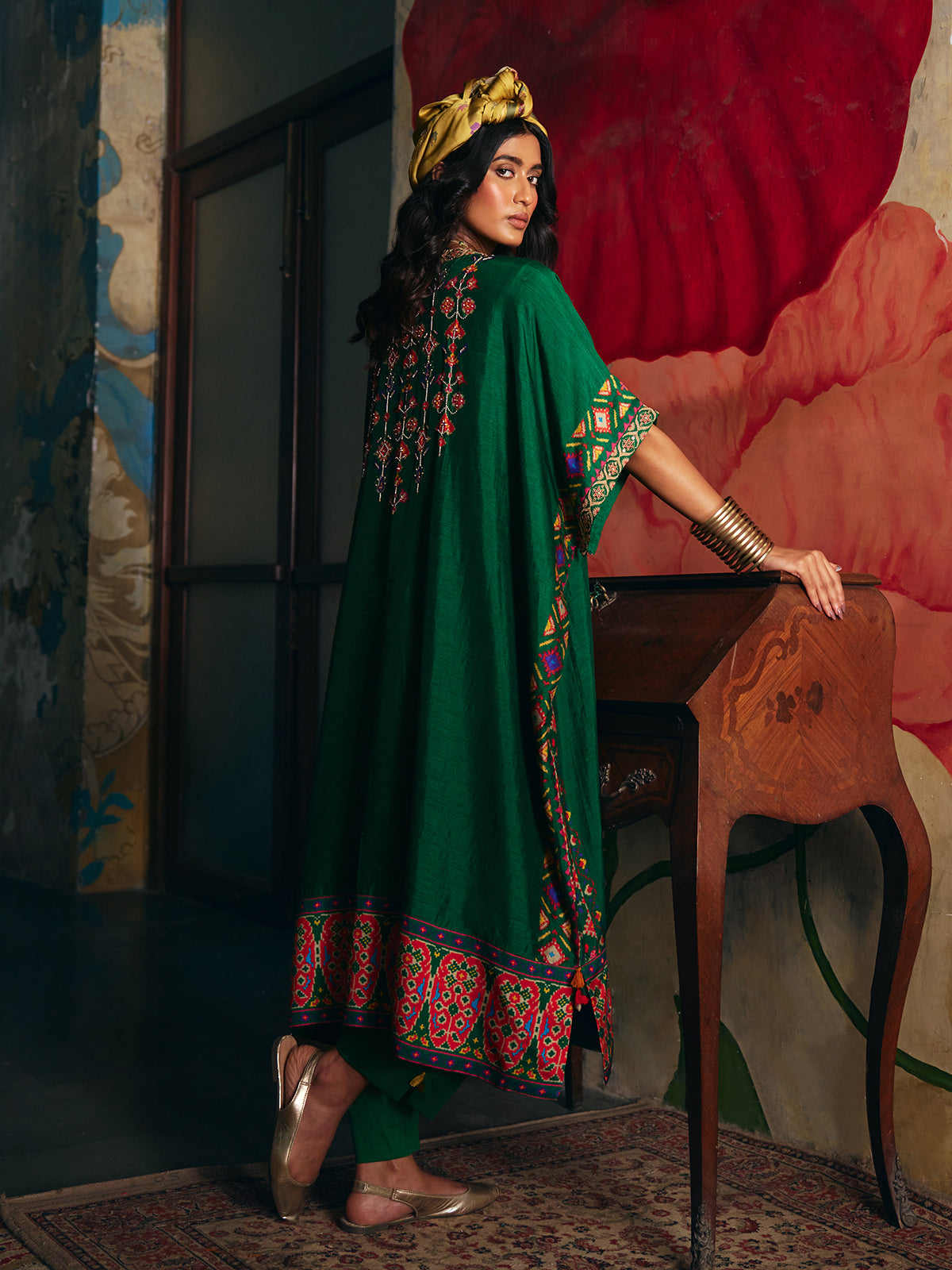 Mehendi green womens kaftan style suit with floral embroidery