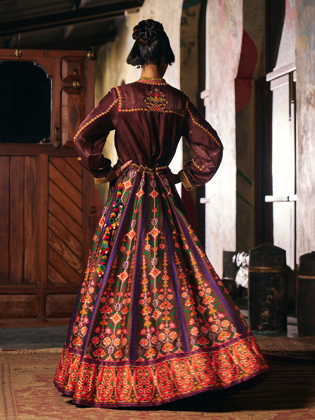 Brown womens floor length Patola suit with mirror embroidery
