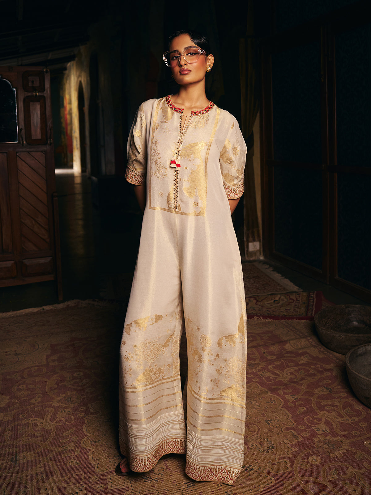 Cream womens designer silk jumpsuit with embroidered neckline