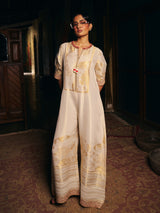 Cream womens designer silk jumpsuit with embroidered neckline
