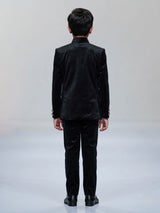 Black velvet boys jodhpuri suit with regal crest detailing