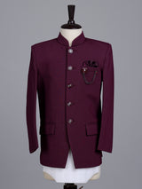 Wine boys jodhpuri suit with jacquard texture and metallic brooch