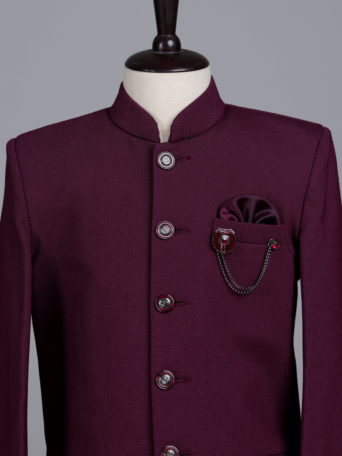 Wine boys jodhpuri suit with jacquard texture and metallic brooch