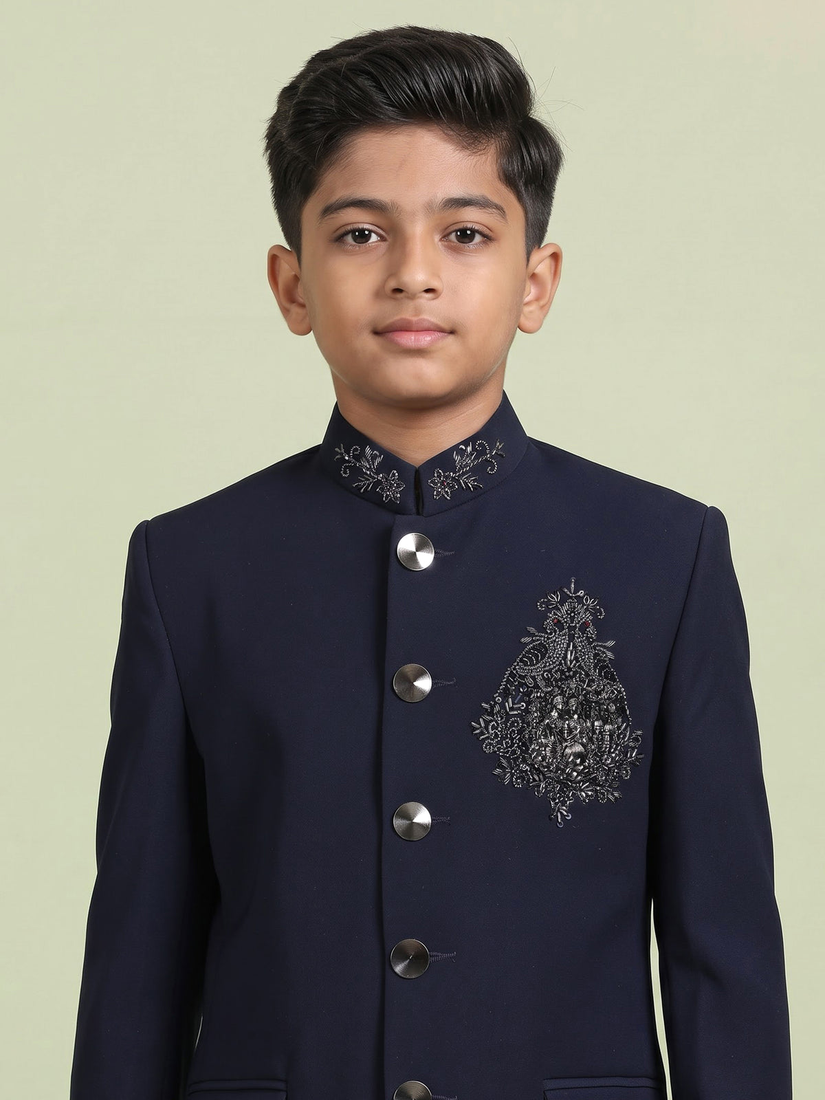 Navy boys jodhpuri suit with embellished crest motif for celebrations