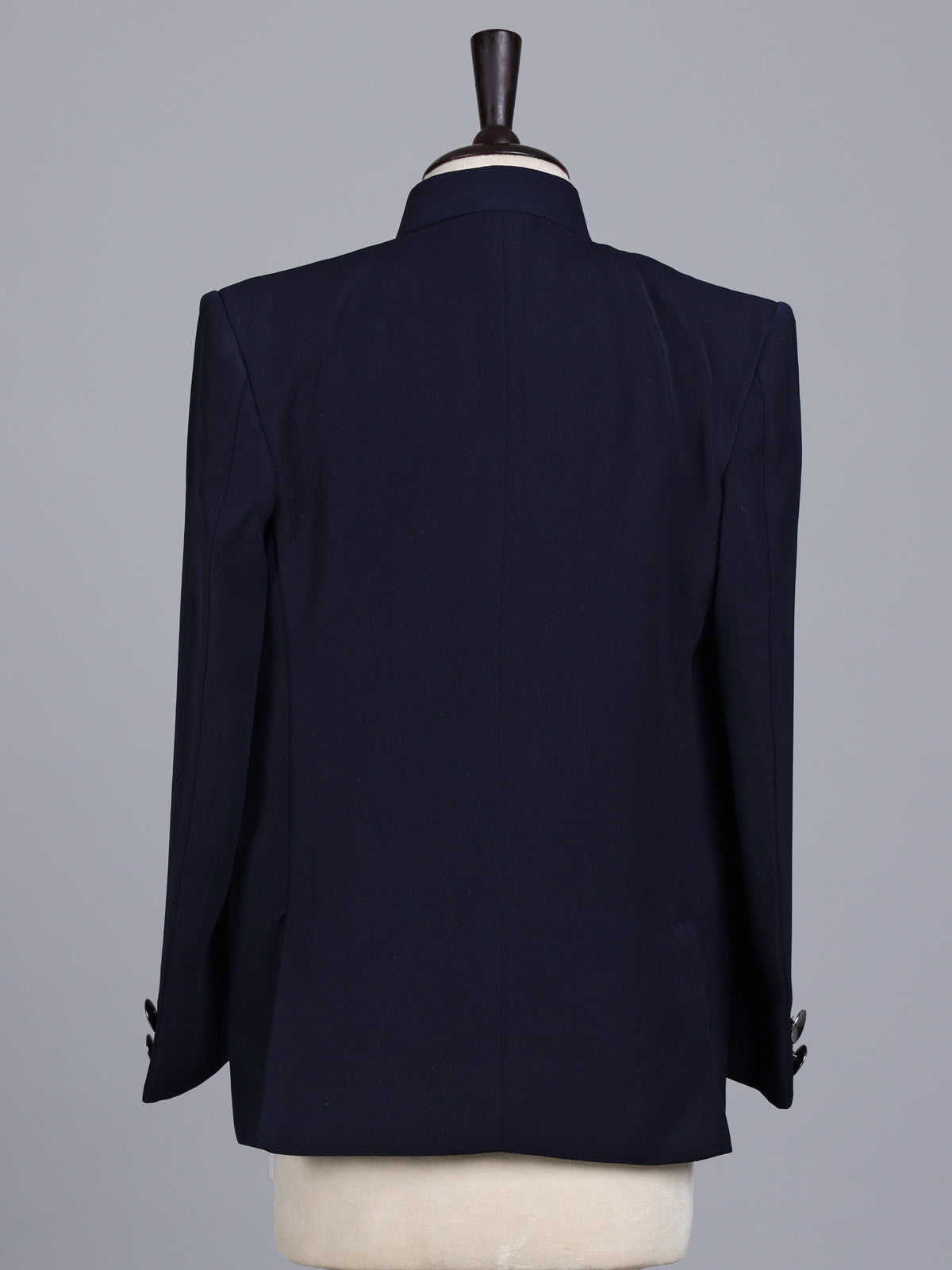 Navy boys jodhpuri suit with embellished crest motif for celebrations