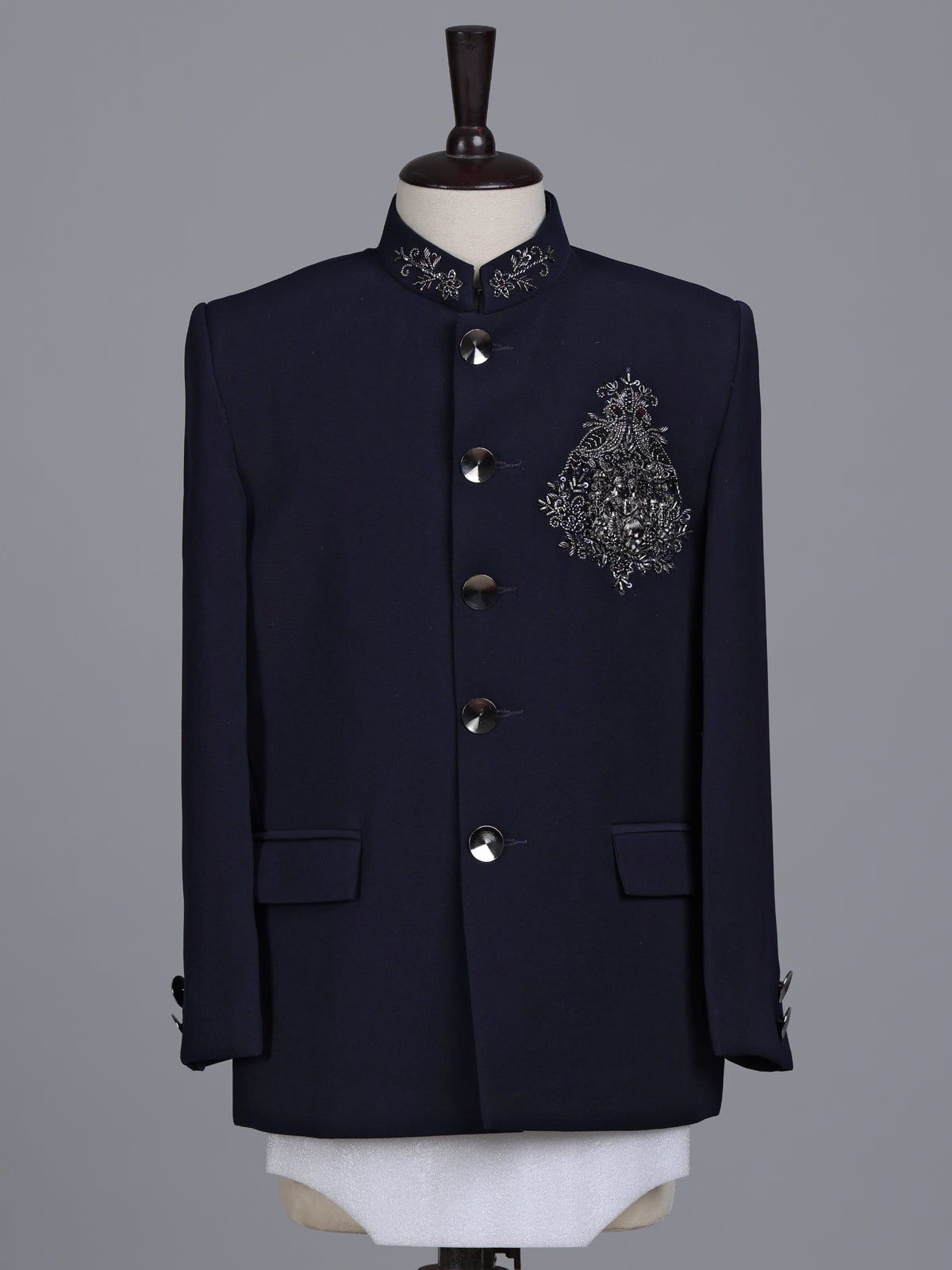 Navy boys jodhpuri suit with embellished crest motif for celebrations
