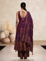 Purple silk anarkali suit with zardosi and pearl embellished details