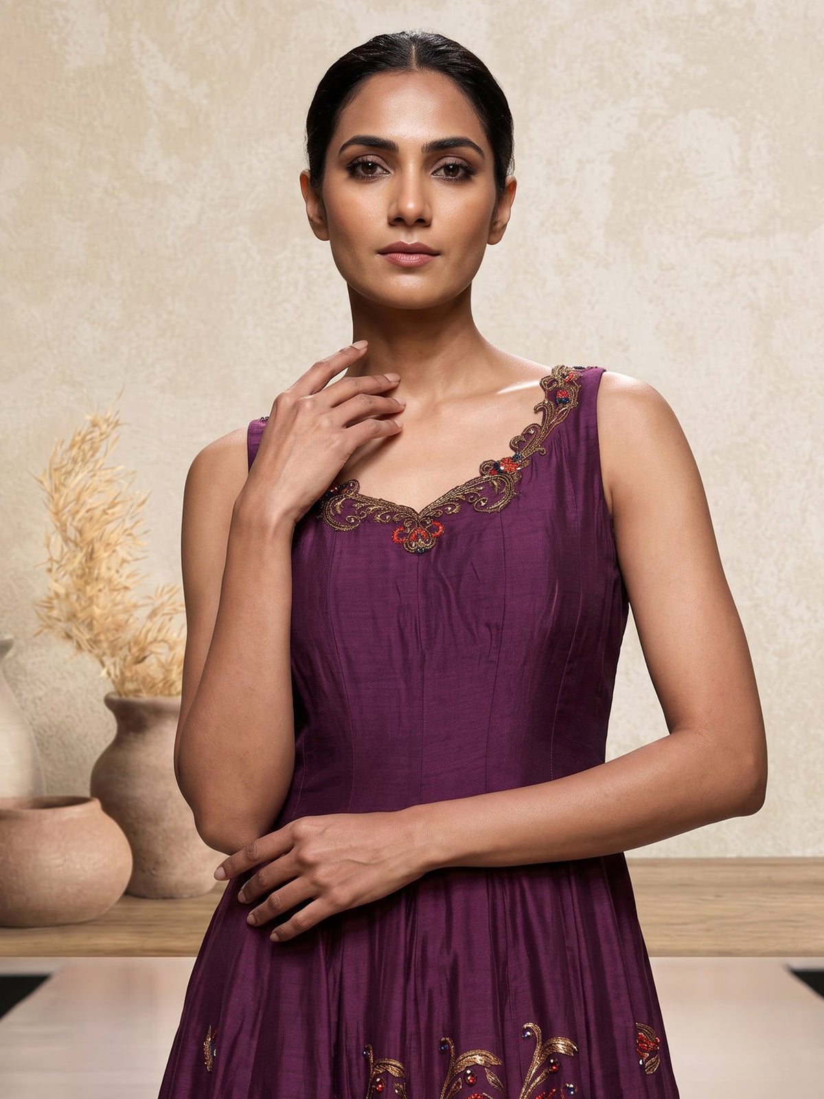 Purple silk anarkali suit with zardosi and pearl embellished details