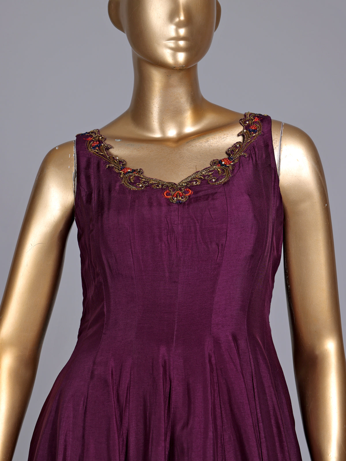 Purple silk anarkali suit with zardosi and pearl embellished details