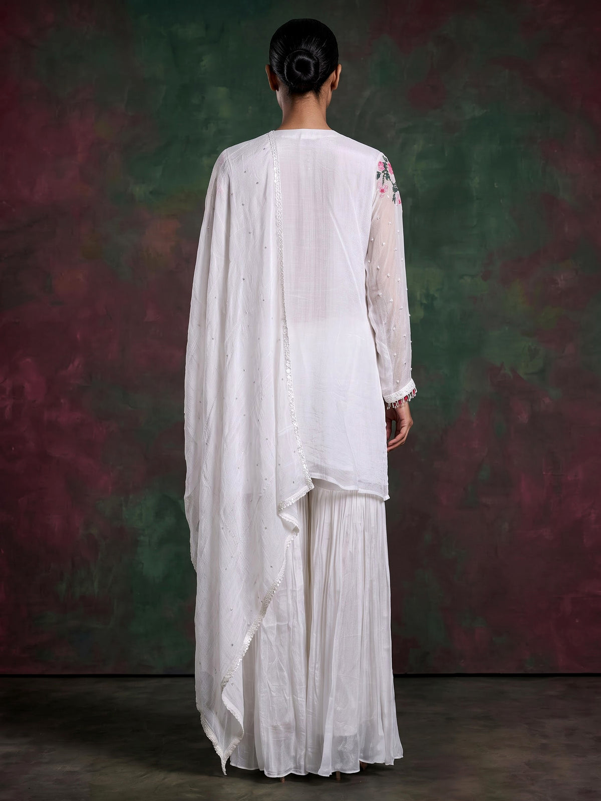 White tissue silk sharara suit with cutdana and tassel detailing