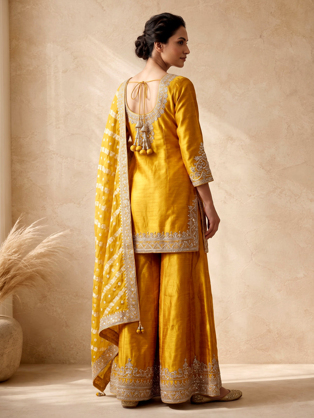 Mustard yellow raw silk punjabi suit with zari dupatta detailing