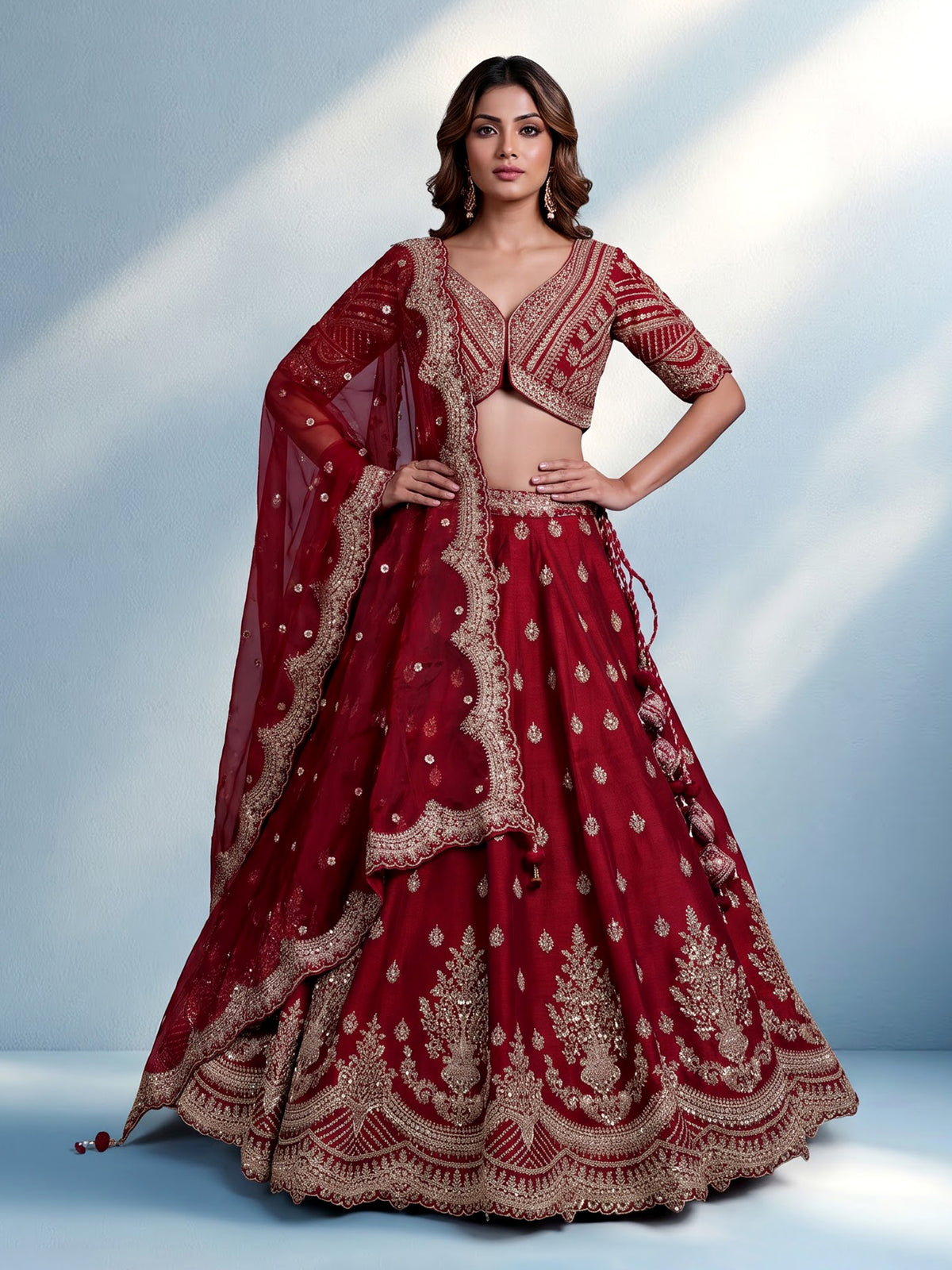 Maroon silk bridal lehenga choli with elegant zardosi embellishments