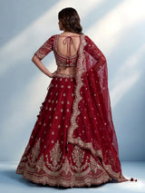 Maroon silk bridal lehenga choli with elegant zardosi embellishments