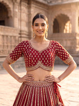 Maroon raw silk bridal lehenga choli with zardosi detailing
