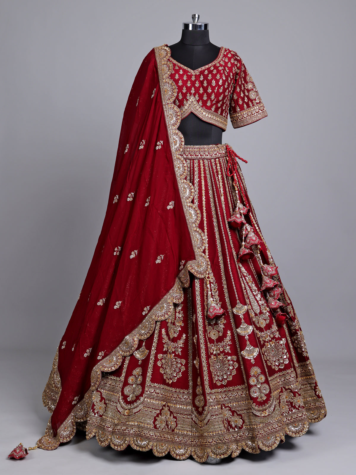 Maroon raw silk bridal lehenga choli with zardosi detailing