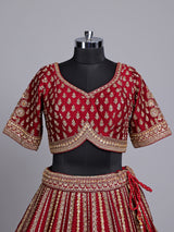 Maroon raw silk bridal lehenga choli with zardosi detailing