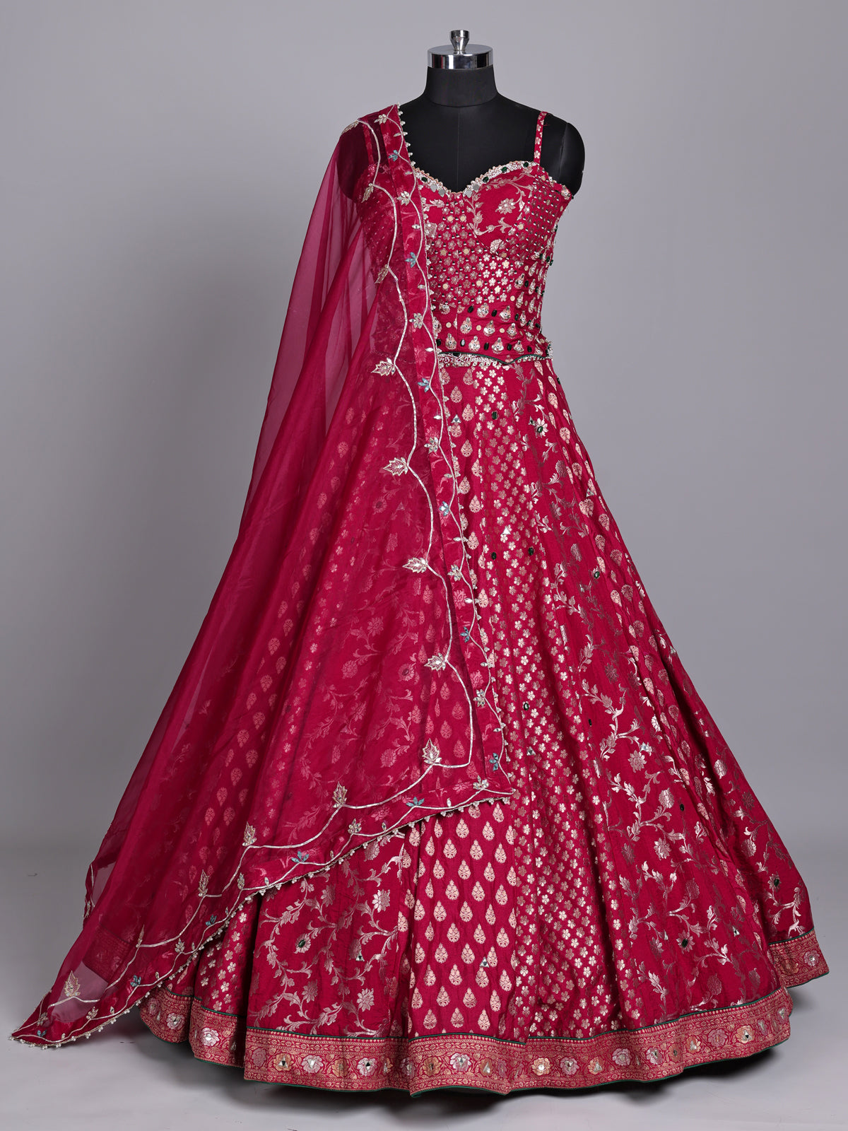 Maroon banarasi silk lehenga choli with embellished dupatta