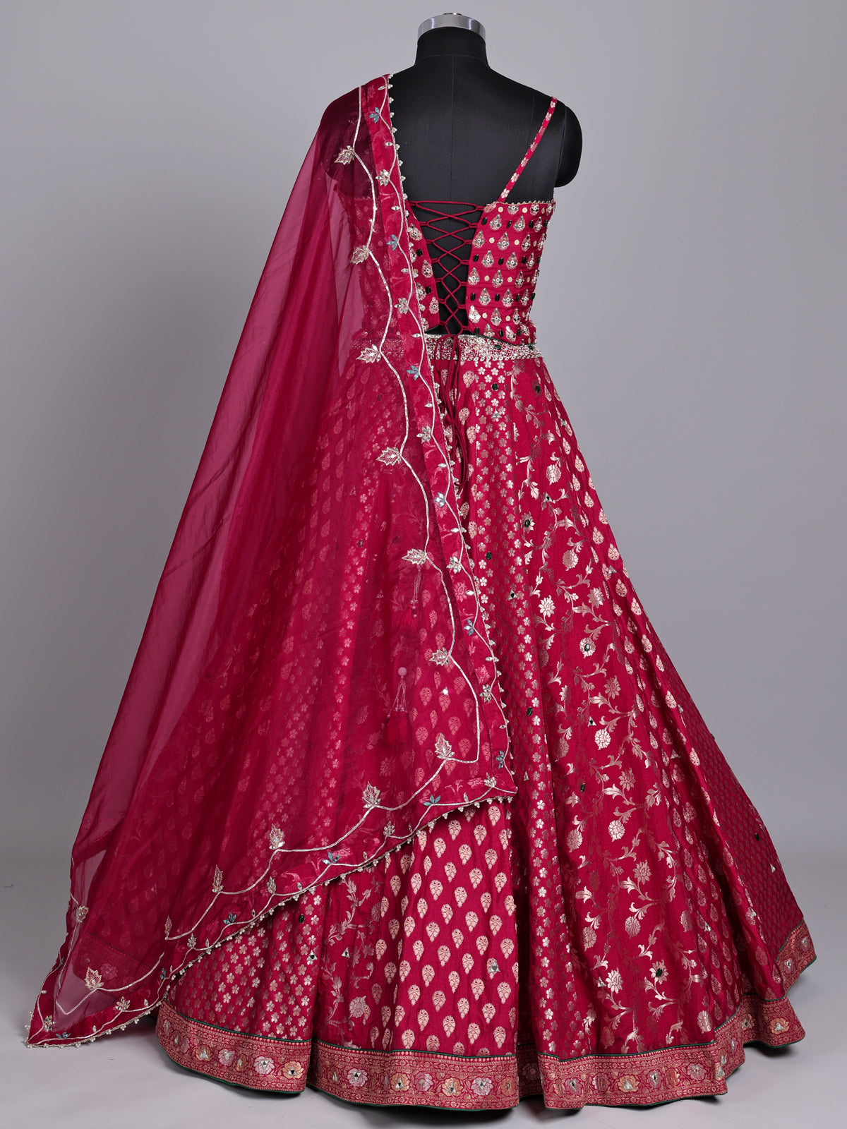 Maroon banarasi silk lehenga choli with embellished dupatta