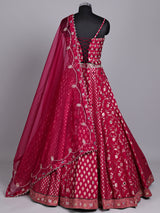 Maroon banarasi silk lehenga choli with embellished dupatta