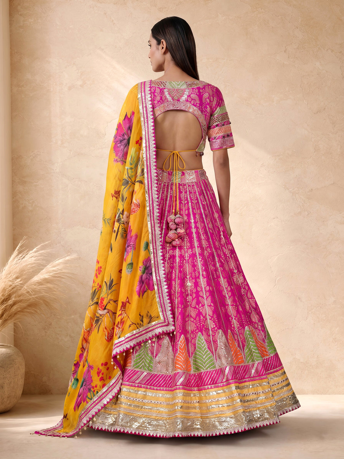 Rani pink banarasi silk lehenga choli with contrast dupatta