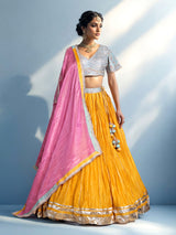 Mustard yellow silk lehenga choli with contrast dupatta choli