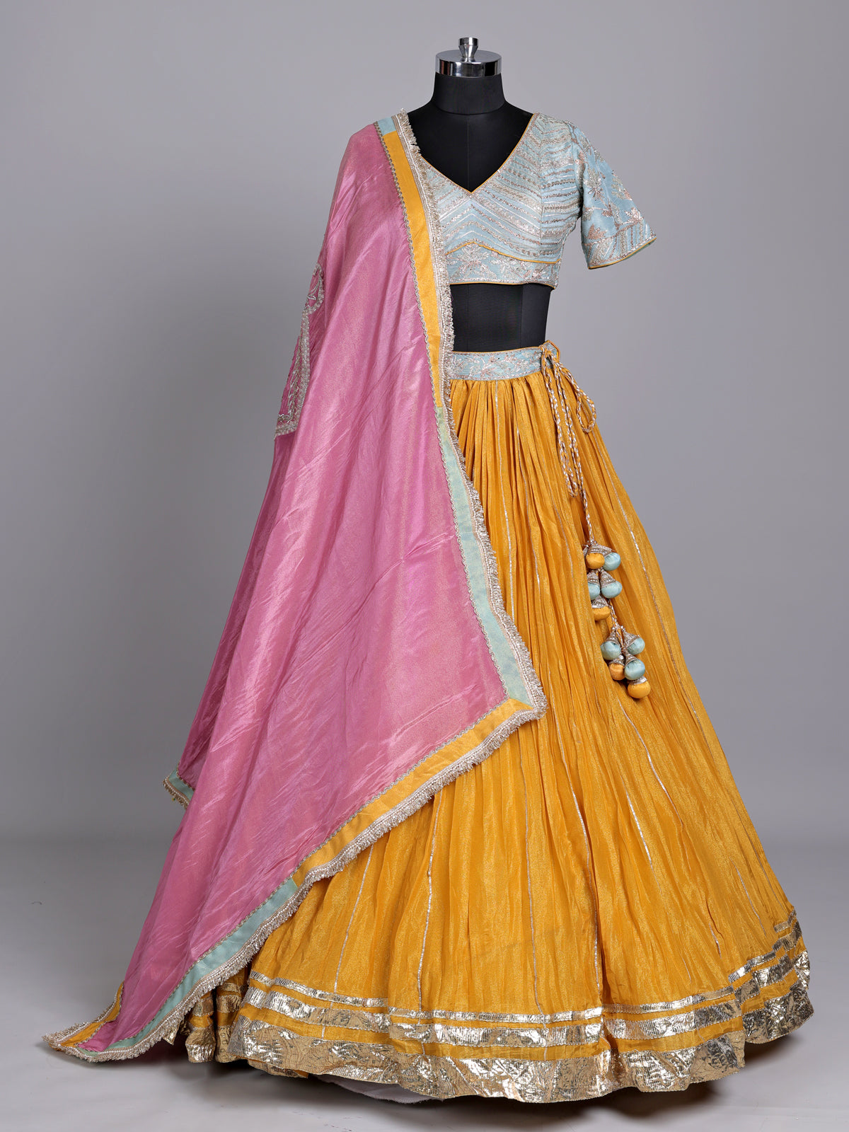 Mustard yellow silk lehenga choli with contrast dupatta choli