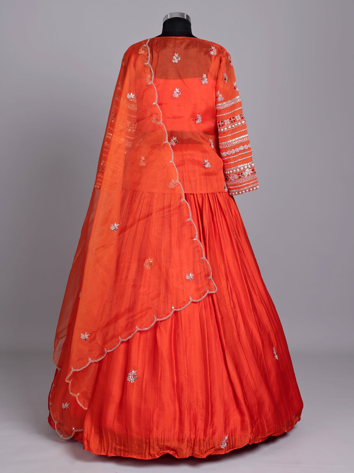 Orange tissue silk lehenga choli with designer three piece styling