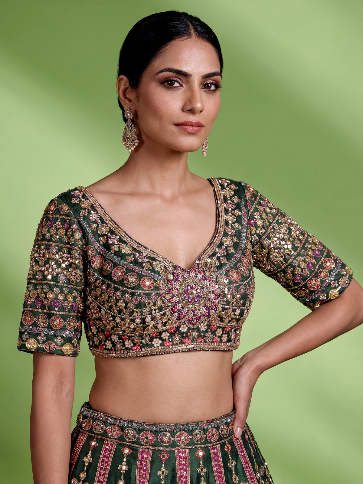 Green raw silk wedding wear lehenga choli with rich work