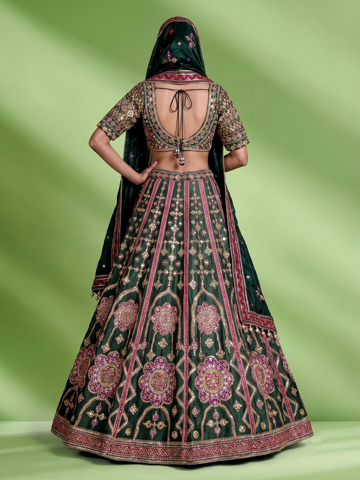 Green raw silk wedding wear lehenga choli with rich work