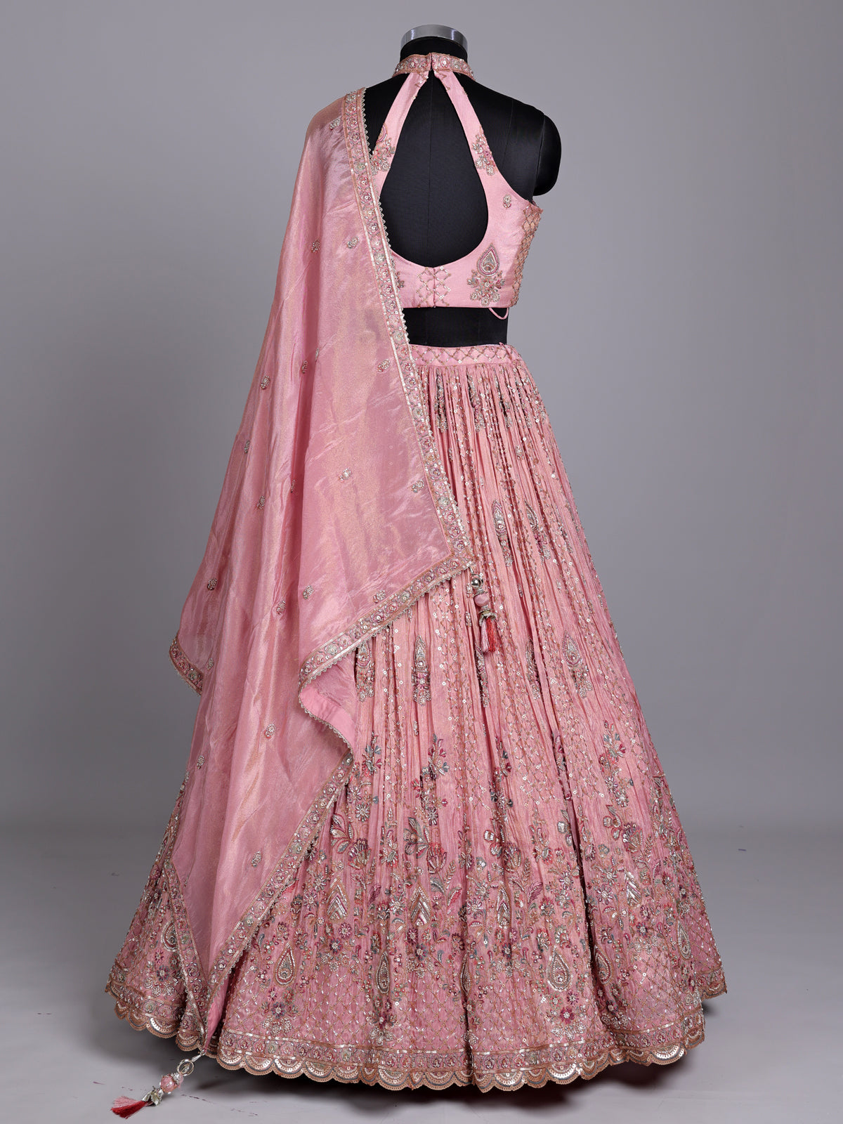 Pastel pink silk lehenga choli with embellished festive detailing