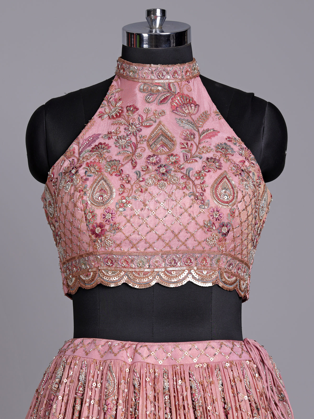 Pastel pink silk lehenga choli with embellished festive detailing